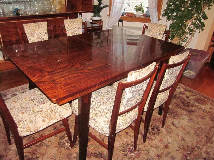 Vintage Danish Modern or European dining room set, solid wood, high glass lacquer with 6 chairs.