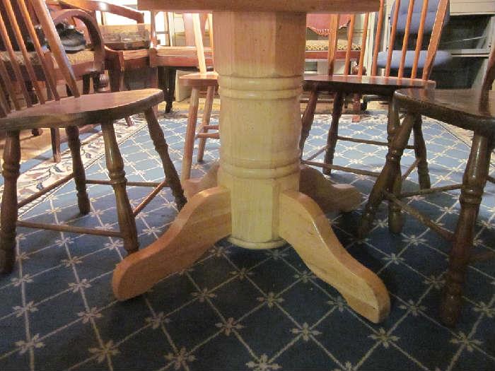 Solid wood, round pedelstal table, seats eight