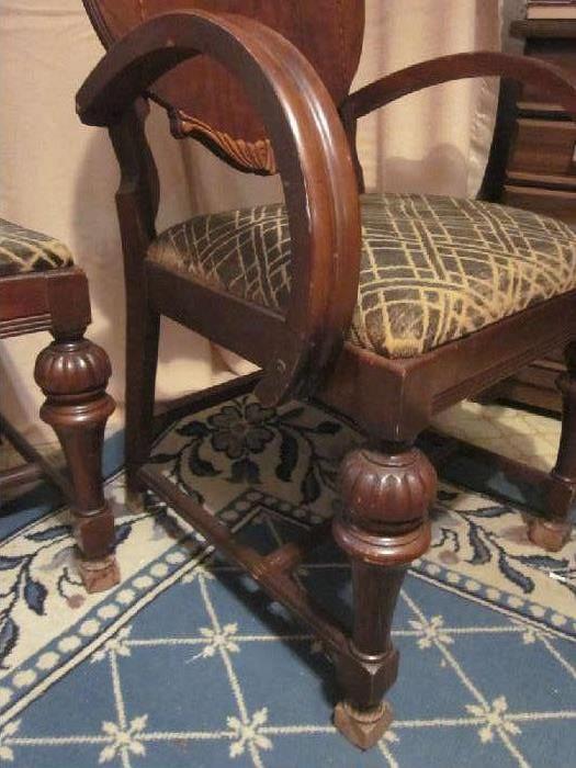 Antique "gentleman's" parlor chair, solid mahogany, bentwood arms, inlaid detail on back.
