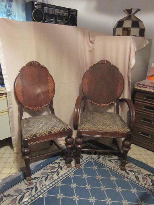 Antique parlor chairs (Lady's and Gentleman's), solid mahogany, carved and inlaid detail on backs.