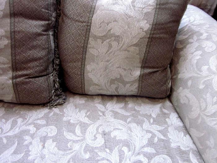 Neutral color overstuffed sofa
