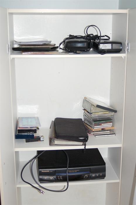 White cabinet and electronics