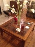 glass top coffee table; faux calla lilies in faux water