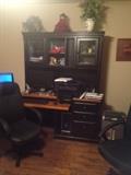 Very nice desk with attached display cabinets above, storage drawers below and 2 nice adjustable desk chairs