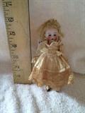 Antique Miniature German doll with glass eyes
