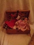 German Doll with trunk and clothing