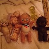 wrap around kewpie, Rosie O'Neill cameo, vaseline glass kewpie and Black kewpie,