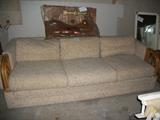 Sofa with bamboo arms