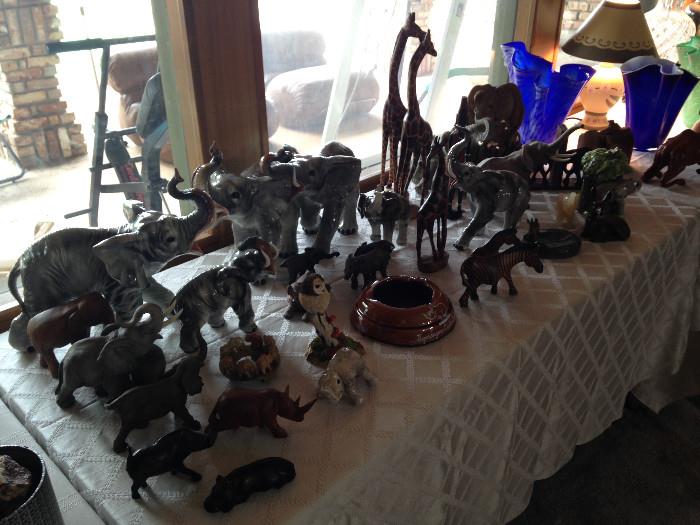 Lots of animal figurines from all over the world
