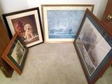 Assortment framed pictures.