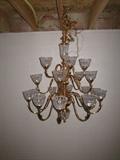 Ornate brass gold tone chandilier.