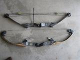 Two compound bows.