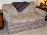 Beige Upholstered Love Seat Sleeper Sofa