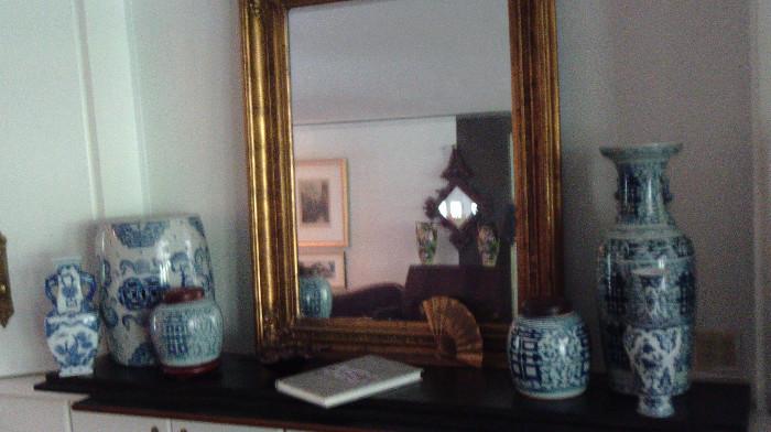 Great antique mirror and lots of blue and white accessories with Asian flair!