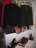 Wonderful designer womens clothing and shoes.
Clothing size Med-Lg Petite. Shoes size 7 1/2 - 8 narrow - medium.
Most shoes and clothing don't even look worn....some new with tags.
Shoes: Trotters, Elites, Clarks, Nickels, Enzo, many Italian made....NICE!