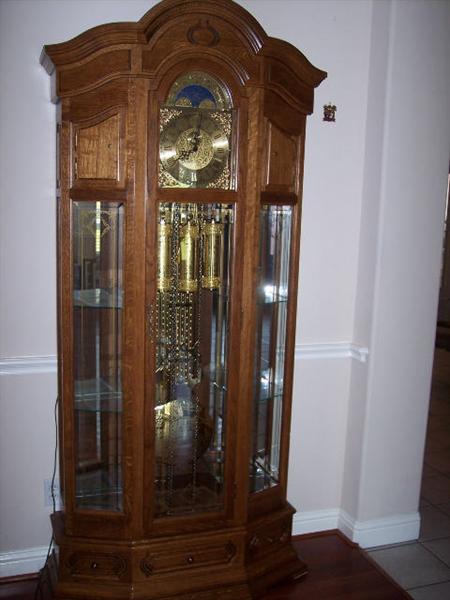 This is one of the most beautfiul Grandfather clocks we have had the pleasure of offering for sale.  From Germany and has 5 different chime options. Also has a night setting.  The curio sides are lighted (german plug but have adapter).