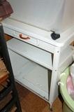 Vintage metal cart with enamel top