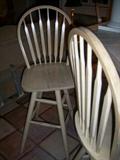 Three bar stools match the tile top table and 6 side chairs