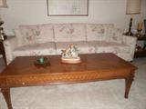 Sofa, coffee table and 2 lamp tables. All you need to fill an empty living room!