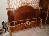 Beautiful bed with curved headboard and side rails