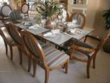 Dining table and 8 chairs - beautiful! There are also bar stools that match the chairs.