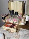 Small sewing kit in wingback chair