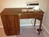Fantastic sewing cabinet and machine. Cabinet can double as a desk when you are not sewing!