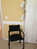 Retro pole lamp and one of 4 side chairs - chairs have castors