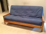 Futon with very thick pad. Like new condition