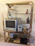 Brass and glass display unit