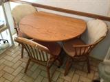 Drop leaf kitchen table with 4 chairs.