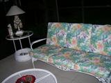 White iron sofa has matching table with 4 chairs. Lounger, coffee table, side table and side chair. Pristine condition. Used only inside