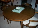 Solid wood table with 4 chairs.