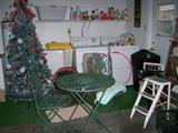 Wonderful Christmas decorations including this amazing pop up tree. The metal bistro table has two chairs and all 3 pieces fold.