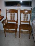 Two of 6 oak dining chairs