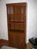 One of two freestanding bookcases