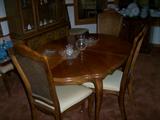 Dining table has 2 leaves with a very pretty top - in excellent condition