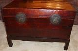 Antique Chinese traveling trunk on frame
