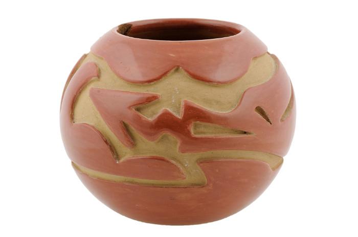 LOT 2: A SANTA CLARA PUEBLO CARVED REDWARE POTTERY BOWL BY MARY CAIN (born 1915)
