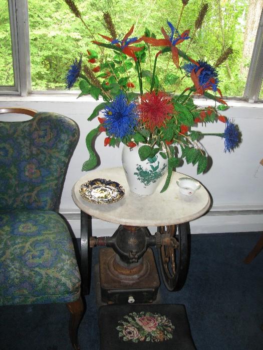 great old large coffee grinder , beaded flowers