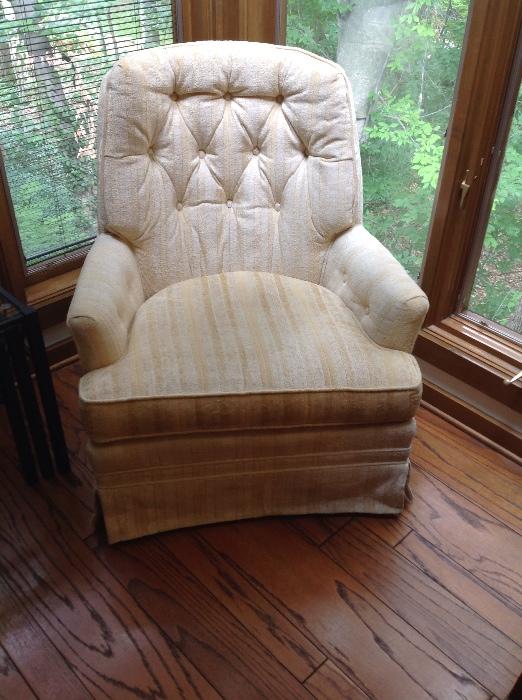 one of a pair of upholstered chairs
