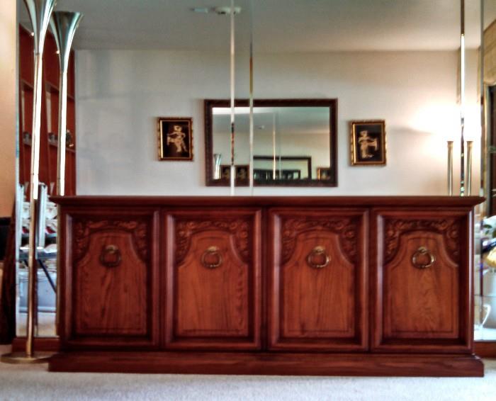 solid walnut credenza with reversible doors for smooth contemporary front.