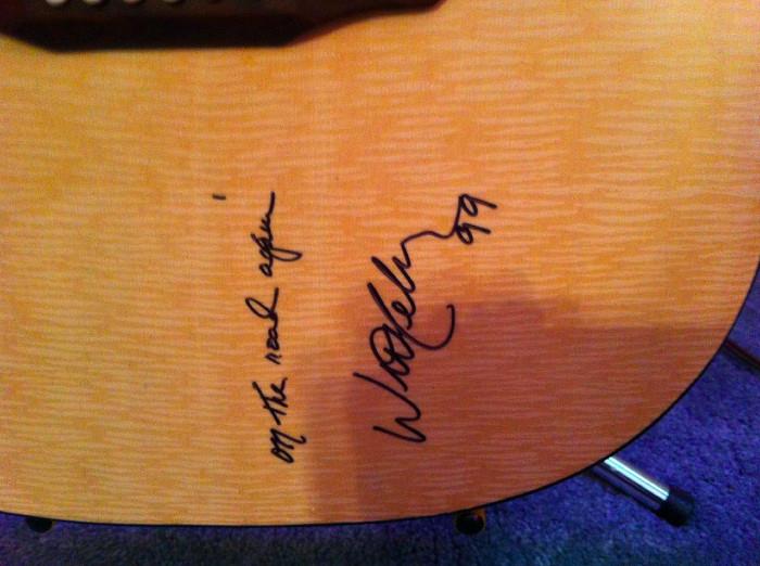Texarkana acoustic guitar, signed by Willie Nelson