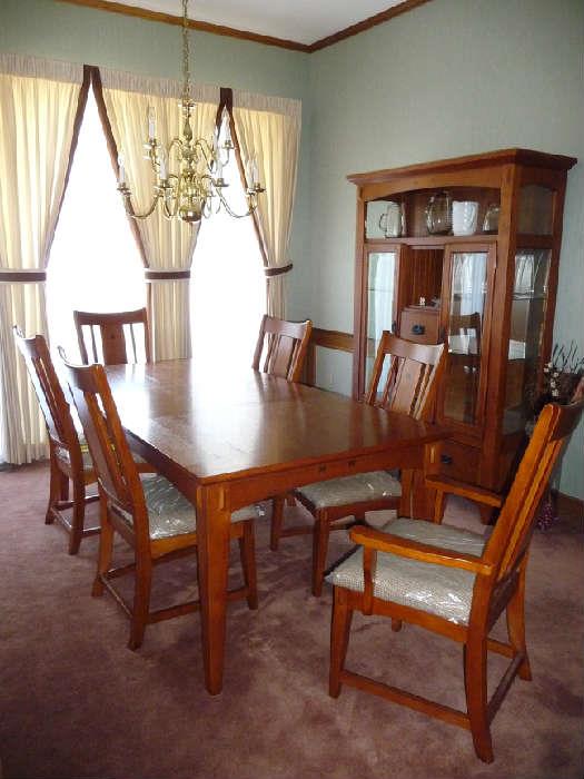 heavy wood table, chairs, side board