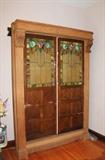 Antique "Project" Piece - Massive antique cabinet with gorgeous beading and wood accents, corbels. Married antique stained glass and oak sliding doors, white moulding that fit around cabinet top
