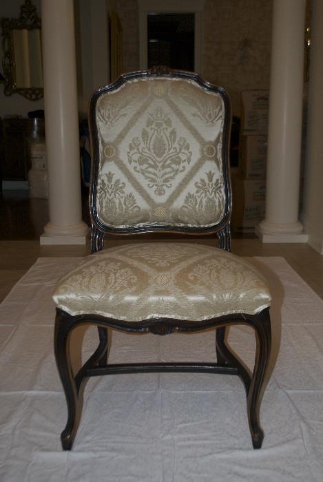Dark wood side chair upholstered in creme silk