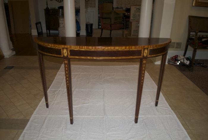 Entry hall demi lune table with wood inlay