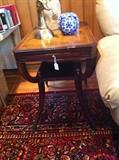         End table; brass duck; lamp (rug not for sale)