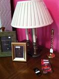                        Lamp; frames; brass candlestick