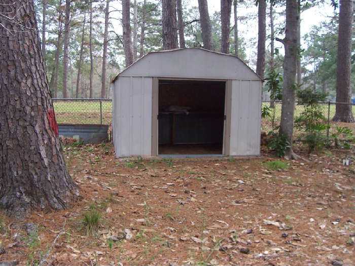 METAL STORAGE BUILDING WITH SLIDING DOORS